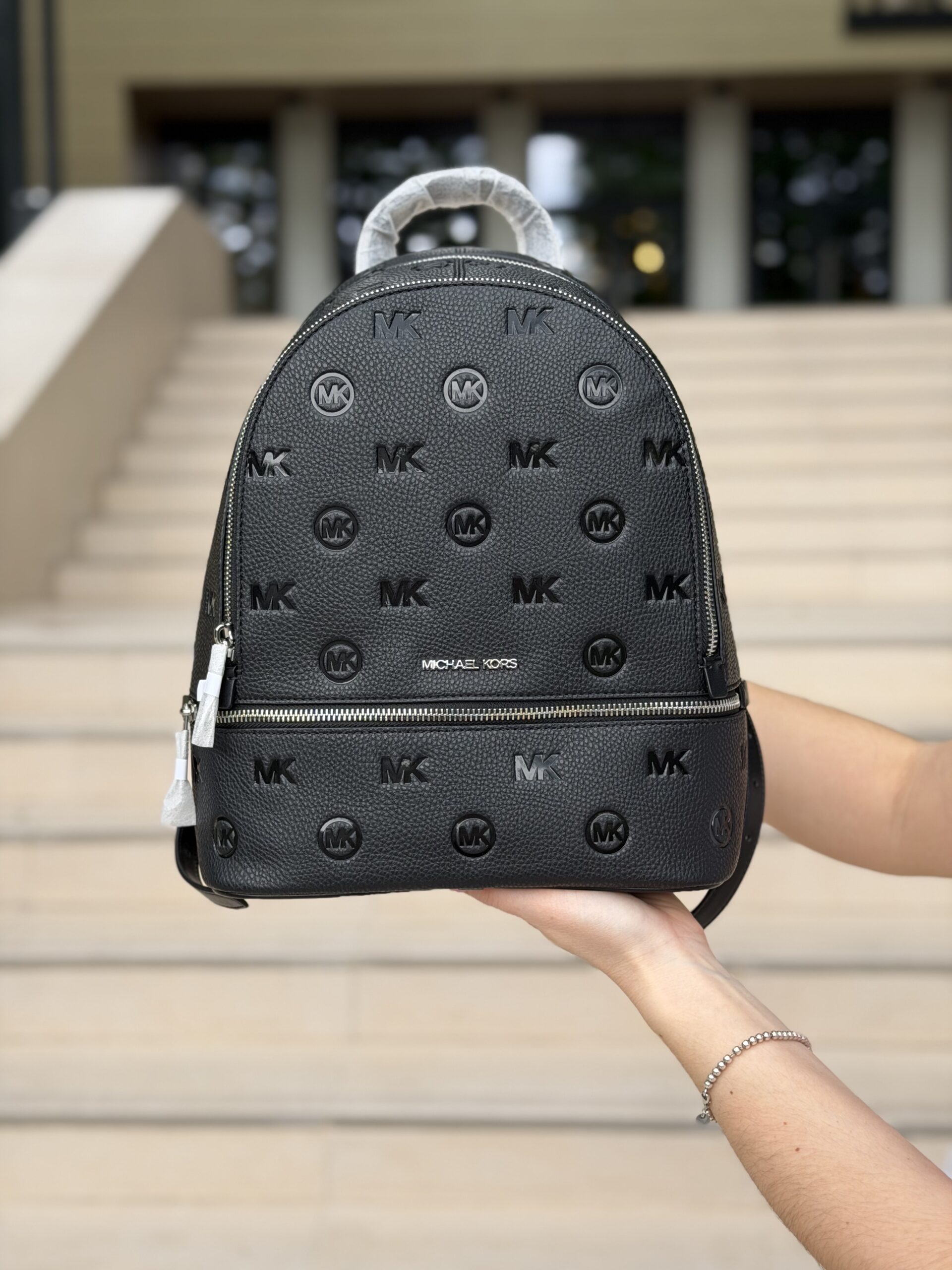 Rhea Medium Logo Debossed Backpack у кольорі Black — жіночий рюкзак Michael Kors